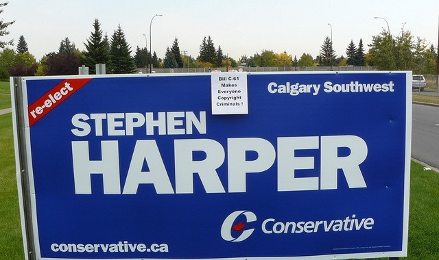 Image for CBC: Tories yank ‘24 hour surveillance’ stickers on signs in Harper’s Calgary riding