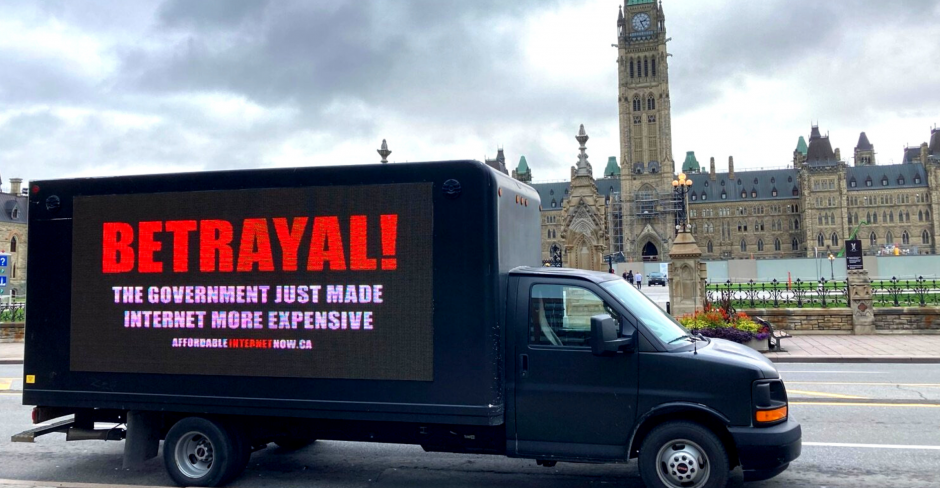 Truck with billboard: Betrayal! The government just made internet more expensive