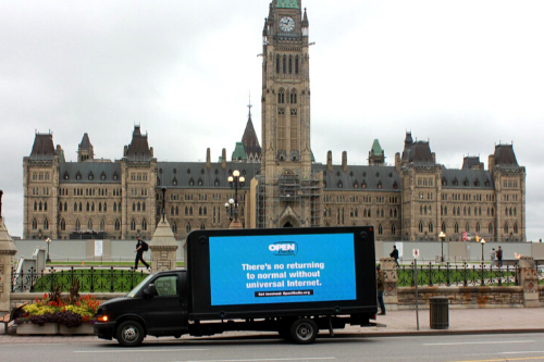 Truck with billboard: There's no returning to normal without universal internet